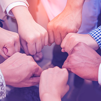 Fists coming together in unity